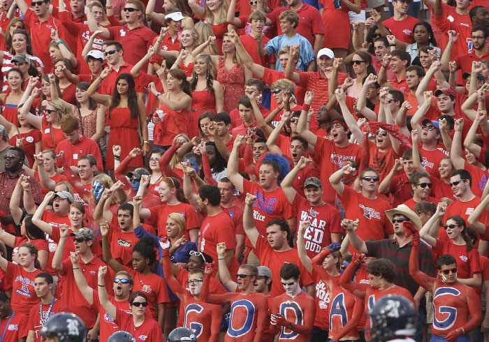 So many Louisiana Tech fans all dressed in red colored clothes cheering for their team